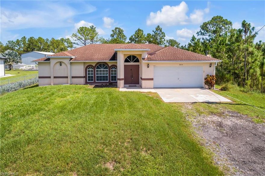 Lovely 2006 Home with 3 Bedrooms/2 Baths/2 Car Garage situated on over an acre of land and Located on a Beautiful Dead End Street lined with newer Homes! Home is Centrally Located off of Everglades Blvd N which offers proximity to a Publix Supermarket, a CVS Pharmacy, minutes to the new Big Corkscrew Island Regional Park Aquatic Center and easy access to Founders Square for Dining and Naples Beautiful Beaches! Home provides an Open Floor Plan with Split Bedrooms and features Tile Flooring throughout, a comfortably sized kitchen with Stainless Steel Appliances, a Pool Bath for your future pool, Laundry Room in Residence, Master Bedroom offers Separate His/Her's Walk-In Closets, Master Bath includes a Large Walk-In Shower with a Double Sink Vanity, NEW 2024 HVAC WITH A 10 YEAR TRANSFERABLE WARRANTY, AND A 2023 WATER HEATER! There are NO HOA FEES, RULES OR RESTRICTIONS! COUNTRY LIVING WITH PROXIMITY TO EVERYTHING!!!
There are about 8'FT/4"Inches on west side of home for a car to access the back.