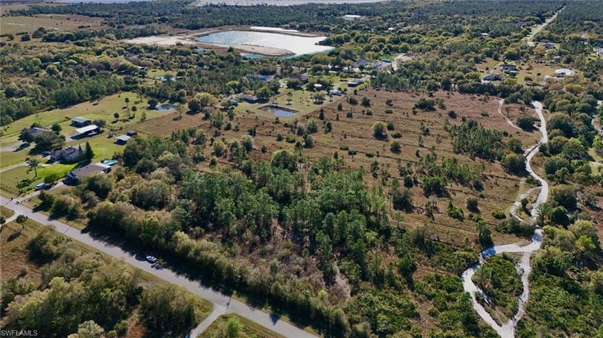 This 1.14-acre parcel in Golden Gate Estates offers oversized-lot living with no HOA and paved road access in a quiet part of Naples. Located outside city limits in Collier County, the property can support a single-family residence, has nearby electric service, and level terrain with natural vegetation (well and septic will need installation), making it ideal for a private homesite without neighborhood restrictions.

An informal wetlands determination is already complete, identifying a defined uplands area suitable for a home and driveway, providing clear guidance for site planning and development. If you’re looking for usable acreage with documented build clarity in one of Naples’ most established estate areas, this lot is ready for a closer look—reach out for the details that matter before it’s gone.