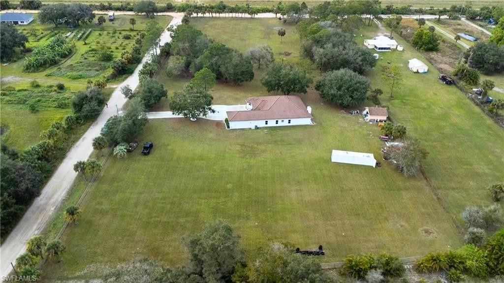 Photo of 16451 Wildcat DR, FORT MYERS, FL 33913 (MLS # 226013409)