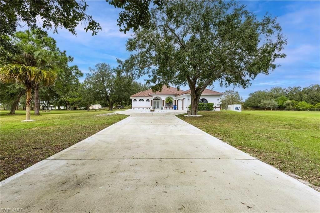 Photo of 16451 Wildcat DR, FORT MYERS, FL 33913 (MLS # 226013409)