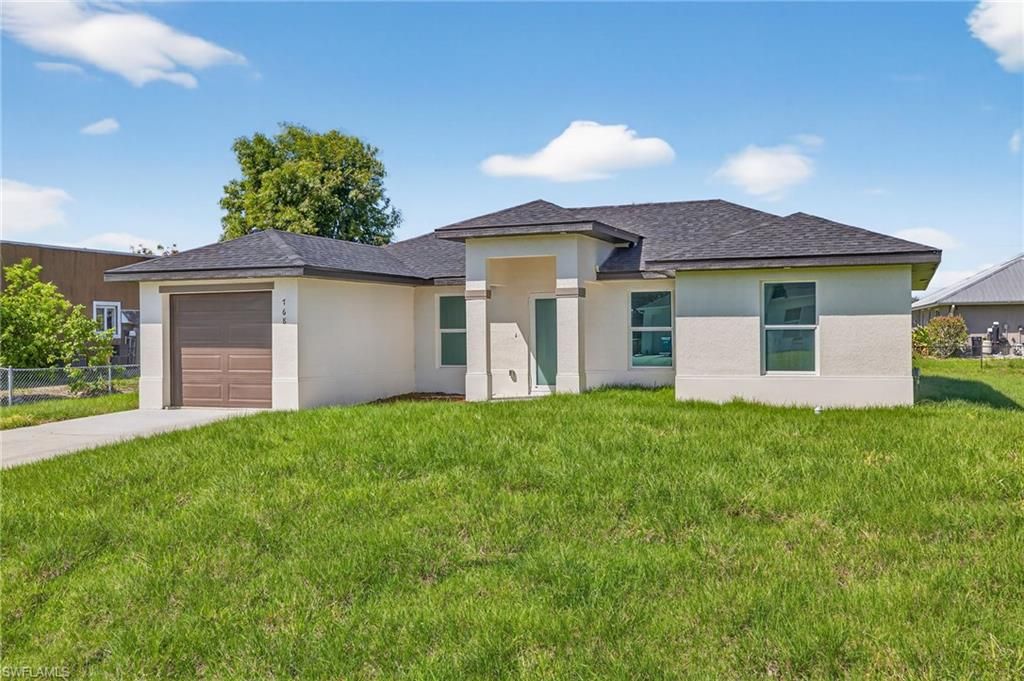 Photo of 768 Breamer AVE S, LEHIGH ACRES, FL 33974 (MLS # 226013195)