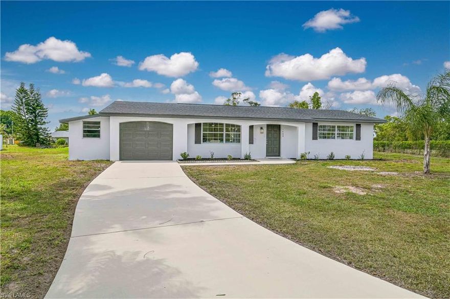 Multiple offer situation, all offers due by 6pm 4/15/2025. Welcome to this Stunning renovated home in Lehigh Acres on half acres, the property has been totally renovated from top to bottom. Step inside, you'll be greeted by stunning porcelain tile that graces the entire house with 5 inches base board gives it the modern feel. The large open concept Livingroom and large kitchen offers great practical space for family and friends gathering and partying. This luxury kitchen carries brand new hardwood cabinets with soft closing features, beautiful quartz countertops, peninsula with waterfall and stainless-steel appliances. Bathrooms have been totally redone with new tile showers, new toilets, and new vanity. Home has brand-new LED lighting throughout the entire house. Property is in X zone, so you don’t have to worry about flood insurance. Garage comes with an additional room with tons of space is ideal for all the storage. Property provides a large screen in Patio Porch is a perfect space to have a cup of coffee in the morning. The rare half acres backyard on the canal provides endless Florida outdoor living lifestyle. Property offers 2025 roof and new Water heater that provide a peace of mind for the new homeowner. Central water and sewer is the icing on the cake. The property is conveniently located off central Lehigh Acres is close to all the main restaurant and shopping in Lehigh Acers. You do not want to miss this.