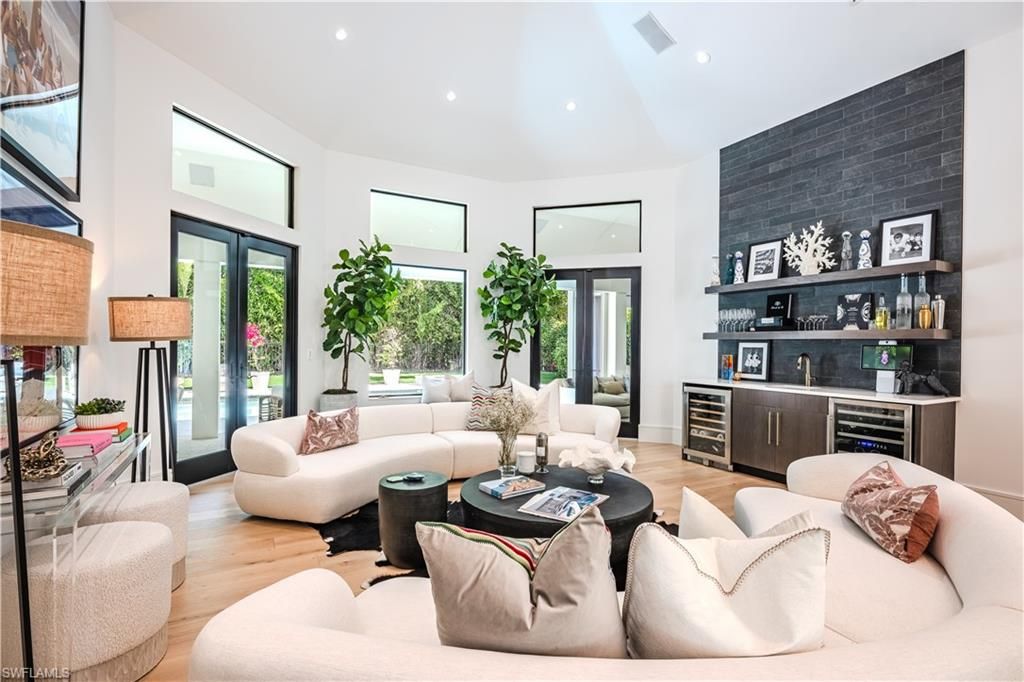 Photo of 681 KATEMORE LN, NAPLES, FL 34108 (MLS # 224019170)