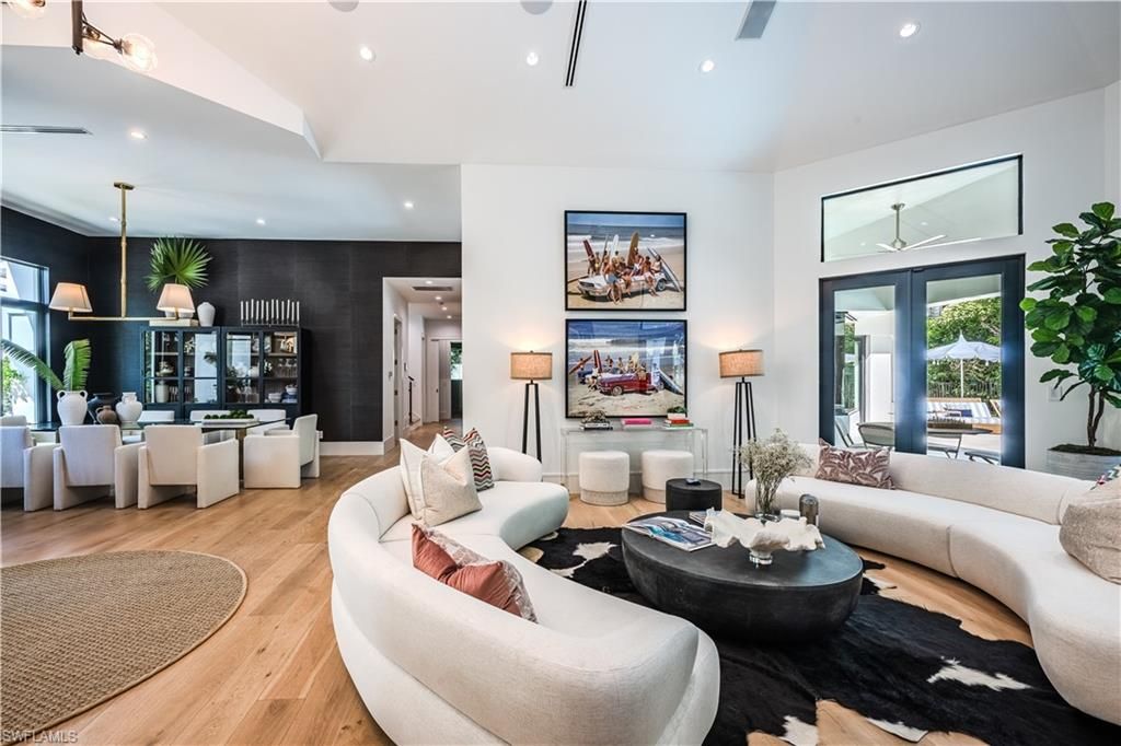 Photo of 681 KATEMORE LN, NAPLES, FL 34108 (MLS # 224019170)