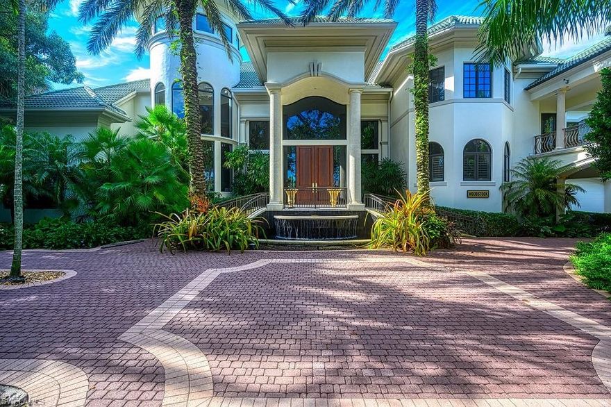 H2631 - A showcase Bonita Bay single family home, rarely available in the Marina Pointe neighborhood. Spectacular riverside setting with 10,000-lb. boat lift. Features 5 bedrooms & den, theater, billiards and game room, spacious guest suites and retreats, expansive lanai with resort-like pool and spa, outdoor living and outdoor kitchen. Garages for three vehicles including a Tesla wall connector. Walking distance to Bonita Bay Marina and the Backwater Jack’s restaurant, or continue on to Bonita Bay’s 11 miles of walking and biking paths. Nearby attractions include a wide array of shopping, dining, beaches and more. Enjoy all that Bonita Bay offers with access to a private marina, community beach park, the finest club lifestyle available with the Bonita Bay Club’s golf, tennis, unmatched fitness and spa facilities.