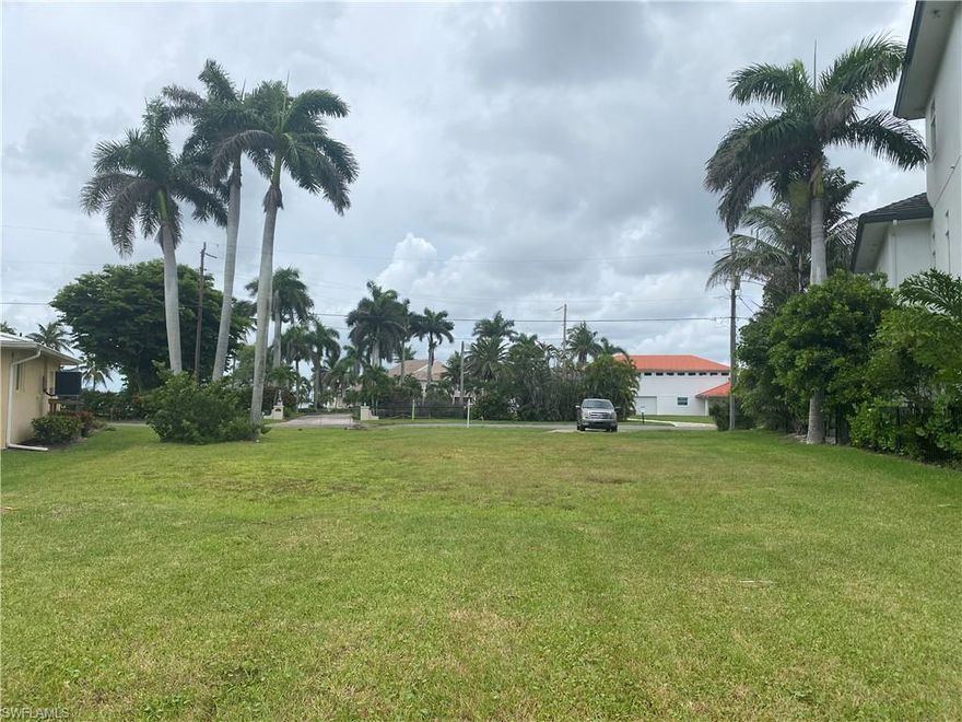 Come and enjoy this beautiful quaint neighborhood of the Carolands  by Bonita Beach

Survey and building plans are available per your request or bring your own design 

It is a pie shaped lot with a boat dock and lift on the Bay and one bridge to the Gulf

Come and build your dream home.   See building plans for existing lot in the attachments