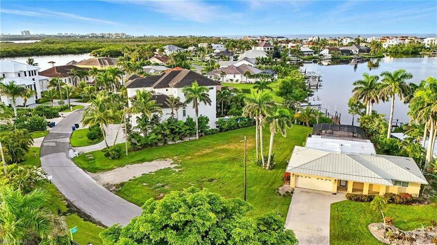 Come and enjoy this beautiful quaint neighborhood of the Carolands  by Bonita Beach

Survey and building plans are available per your request or bring your own design 

It is a pie shaped lot with a boat dock and lift on the Bay and one bridge to the Gulf

Come and build your dream home.   See building plans for existing lot in the attachments

ANOTHER LOT WITH LARGE WATERFRONT ALSO AVAILABLE . LOOK AT THE LAST PICTURES.