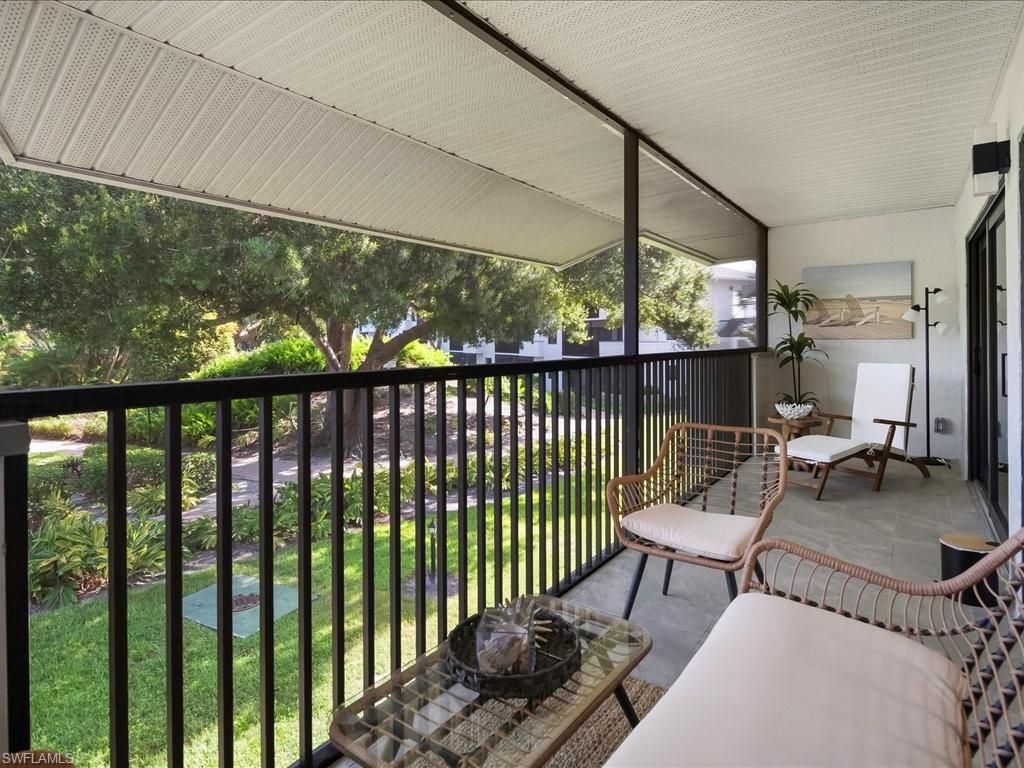 Photo of 600 Neapolitan WAY #225, NAPLES, FL 34103 (MLS # 225080683)