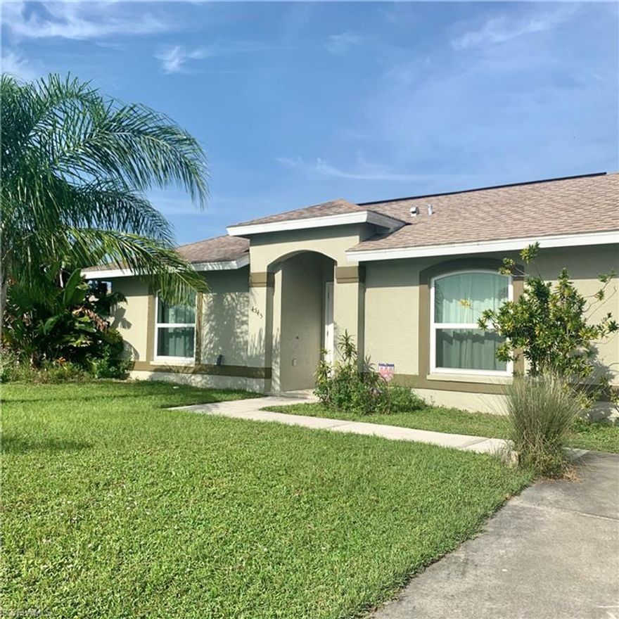 Great 4 bedroom/2 bath home on over 1 acre!  Close in - just 6 minutes to the grocery store, restaurants.  Light, bright, high ceilings, open great room floor plan!  Tiled throughout, new roof, impact windows.  Ample parking, with a long drive and additional parking spot.  Fruit trees include mango, leeche, avocado, cherry of the Rio Grande, star fruit, and orange!  There is a pond at the rear of the lot!
