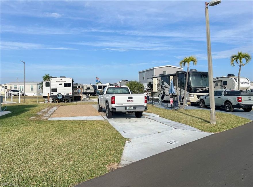 Soak up the best of what Florida has to offer. Great location, just a short stroll to the clubhouse, pool, tennis and new pavilion. Palmetto Palms RV is a 55+ Condo HOA where you OWN THE LAND! Park your RV or place a new park model,, tiny home, or manufactured home. Located in the non-pet area. So close to Fort Myers Beach and Sanibel Island, with endless opportunities for boating, beach outings, dining, and so much more. Embrace the SW Florida tropical lifestyle at Palmetto Palms RV!