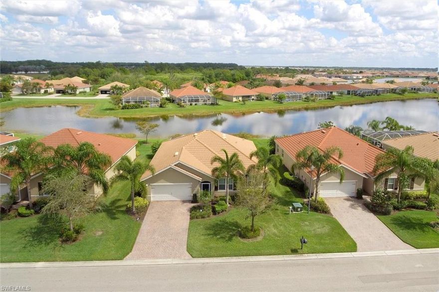 Amazing Waterfront Home with 3 BR, Den, 2 Baths and extended lanai 14 X 24 to enjoy your morning sunrises over the lake.  You will enter this home through the wide foyer that opens into great room, kitchen and breakfast room off kitchen with a view of the lake. Across the street you have a preserve that will not be built on.  The den is to right of the entry foyer offering many optional uses. Tile throughout main living areas, laminate flooring in the den and main bedroom. The kitchen features granite counters, large island breakfast counter with sink, maple cabinets, no print refrigerator and walk in pantry.
Total privacy for guests down the side hallway with loads of closet storage, 2 spacious bedrooms and bath.  Laundry room is located off garage entry with a nook that could be used as another storage or bar area.  
Main bedroom overlooks the lake to enjoy the morning sunrise. Ceiling fans in all rooms.  Your expanded outdoor living area gives you so much more room for entertaining. Cascades offers large clubhouse, exercise room, lap pool, hot tub, BBQ areas, tennis and pickleball courts, bocce ball and miles to walk.  Pay as your play golf or join the River Hall Country Club.