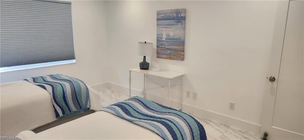 Photo of 3000 Gulf Shore BLVD N #113, NAPLES, FL 34103 (MLS # 226011703)