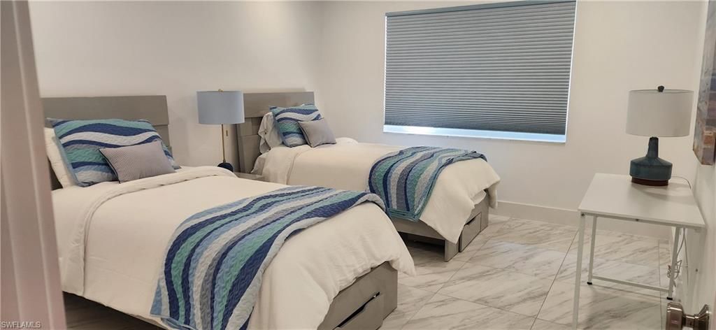 Photo of 3000 Gulf Shore BLVD N #113, NAPLES, FL 34103 (MLS # 226011703)