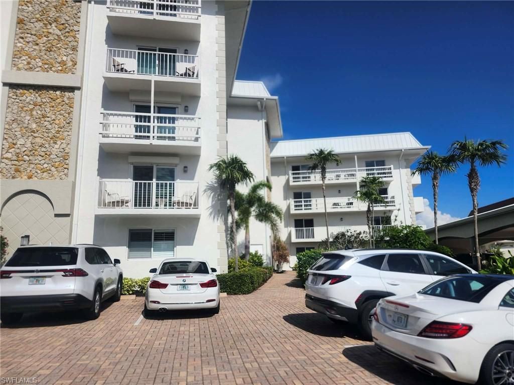 Photo of 3000 Gulf Shore BLVD N #113, NAPLES, FL 34103 (MLS # 226011703)