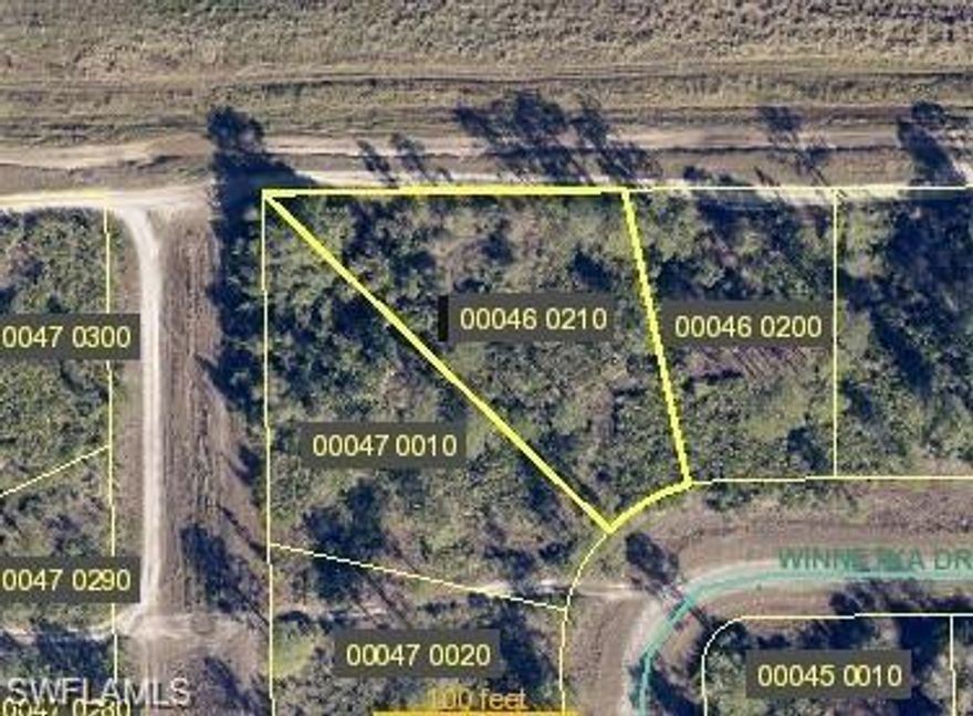 Discover this oversized 0.47-acre lot offering privacy and a peaceful setting while remaining conveniently close to everyday essentials. Located in the Greenbriar area near SR-80, this property provides easy access to Fort Myers and surrounding areas. With no HOA fees and situated in flood zone X (where flood insurance is typically not required by most lenders), this lot presents an excellent opportunity to build your dream home with room to spread out and enjoy the Florida lifestyle.