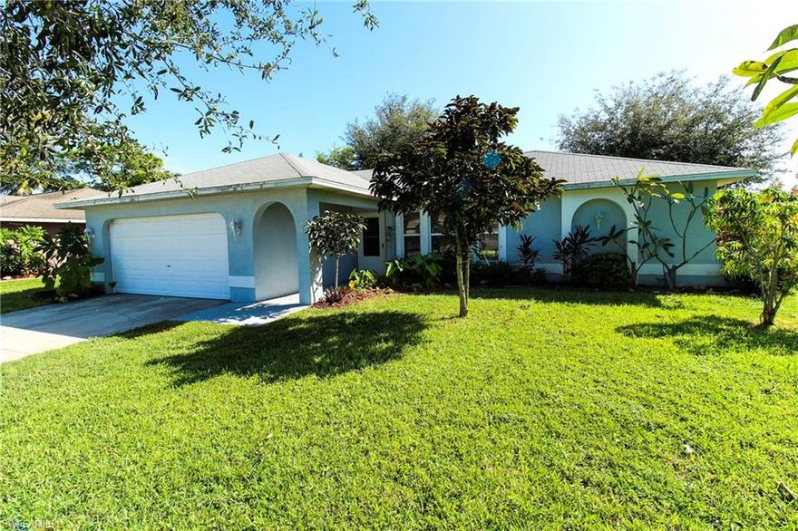 Convenient location with quick access to Del Prado Blvd and the Pine Island corridor.  This 3 bedroom/2 bath home has been FRESHLY PAINTED inside and out.  BRAND NEW CARPETING just installed in the bedrooms and main living area and CERAMIC TILE in the kitchen, bathrooms and wet areas. CITY WATER/SEWER.  ASSESSMENTS PAID. LARGE FENCED-IN yard with lots of mature trees.
