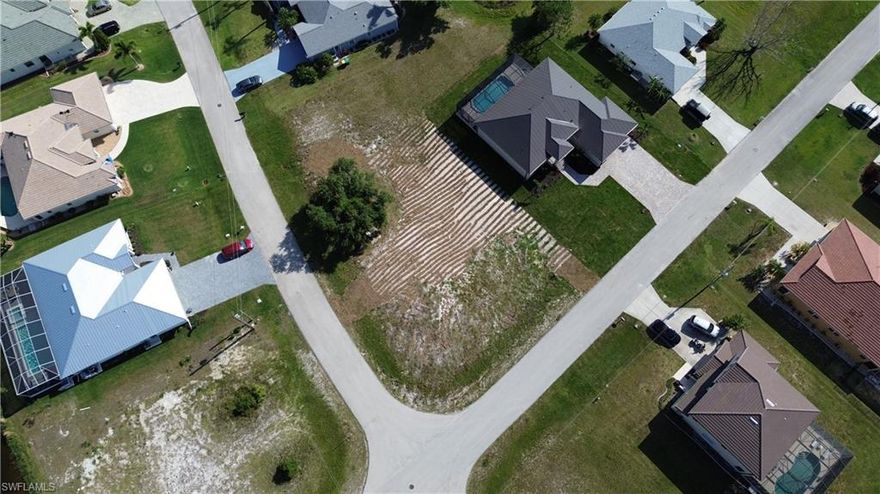 Hurry on this one as it’s priced BELOW assessed value for quick sale!  This oversized corner lot is the perfect choice for your next home.  Located in the desirable Burnt Store Lakes community, just North of Burnt Store Marina, with numerous lakes and greenbelts running throughout the development.  This location is only getting nicer as the word gets out and more new homes are built throughout the community.  And unlike much of nearby NW Cape Coral, county water and sewer is available here, making this location the superior choice.  It’s close proximity to Burnt Store Marina means great boating and golf is right around the corner too!  Very few lots are priced this aggressive, so get your offer in quickly!