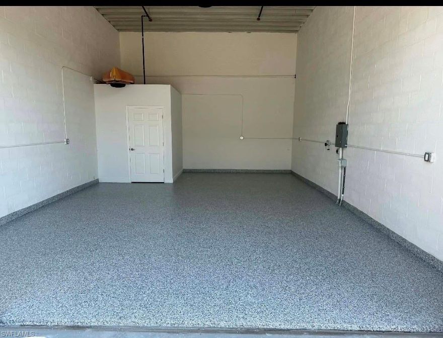 NEW EPOXY FLOORS JUST ADDED! SELLER IS OPEN TO OFFER SELLER FINANCING OPTION/ LEASE OPTION on this Luxury storage unit at Toy Vault of Fort Myers in immaculate condition. Very safe and great location! Ideal for vehicle, RV, boat, or collectible storage. Features a 5” reinforced concrete slab rated for vehicle lifts, full block walls and precast concrete roof. Includes 100-amp electric , 50-amp 208V outlet, 2.5-ton mini-split A/C, and two 33,000-lumen high-bay lights. insulated hurricane-rated roll-up door and ADA-compliant half bath with vent fan and emergency lighting. Gated facility with 24/7 security, owners’ lounge, and low monthly assessments with WiFi included.