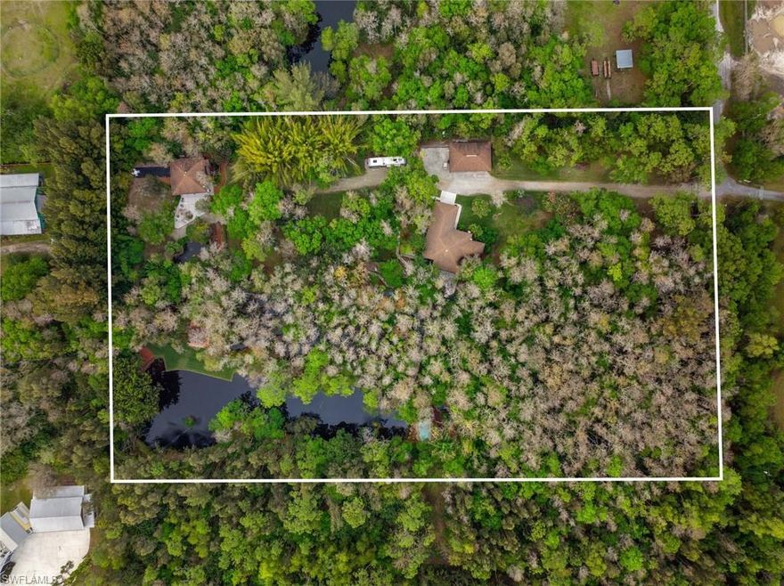 This 5 acre OASIS is absolutely beautiful, peaceful, quiet and serene. Your own botanical garden in your backyard. Over 50 Koi within the 4 ponds on the property. Filled with lush landscaping and an adventure every day. The main home has 3 bed and 2 bath with a 2 car garage. A guest home offered turnkey is also on the property ( Studio Apt with bathroom and garage ) and a detached garage with 2 more spaces. The current homeowner also has a spot for her RV. Be sure to watch the video and see what this amazing property offers. Truly a uniques experience.