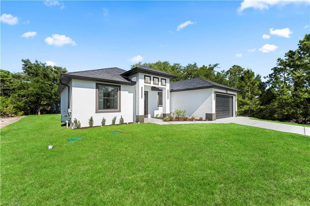 Photo of 3701 Ida AVE N, LEHIGH ACRES, FL 33971 (MLS # 226017584)