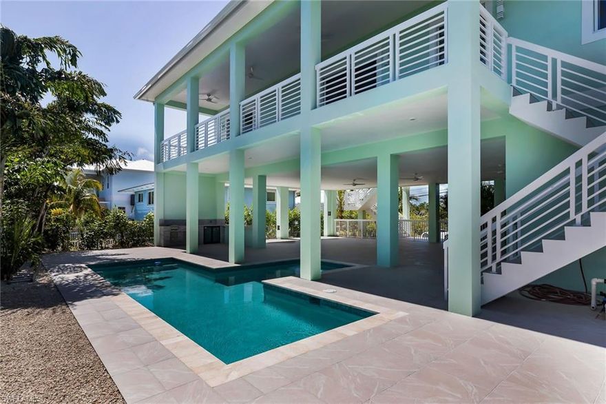 New Construction, walking distance from Sombrero Beach. 
This stunning new construction home offers the ultimate in luxury coastal living. Featuring 5 bedrooms and 5 full bathrooms, every bedroom includes its own private en-suite for maximum comfort and privacy. One bedroom and bathroom are conveniently located on the first floor, perfect for guests or easy accessibility. 
All main living areas are elevated above flood level, providing peace of mind while enjoying the island lifestyle. 
Step outside to your private tropical retreat with a beautiful pool, extensive lanai area, and a fully equipped outdoor kitchen, perfect for entertaining year round. 
Located in a very high performing vacation rental neighborhood, this property presents an incredible opportunity for both personal use and investment potential. 
Enjoy being just a short walk to Sombrero Beach in the beautiful Florida Keys.