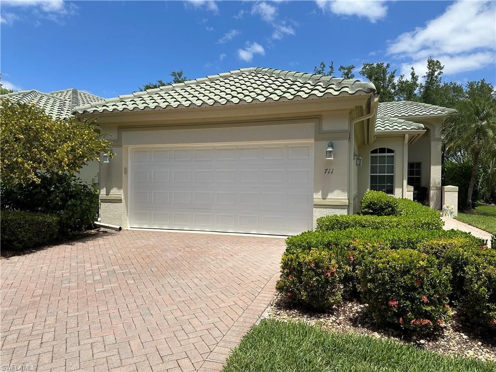 Photo of 711 Vistana CIR #41, NAPLES, FL 34119 (MLS # 226008070)