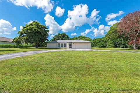 Photo of 811 Cassena RD, NAPLES, FL 34108 (MLS # 226038603)