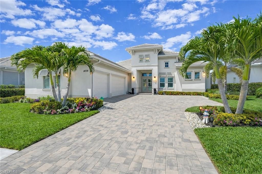 Photo of 14338 Laguna Springs LN, NAPLES, FL 34114 (MLS # 226015838)