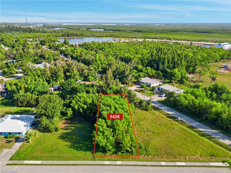 Discover the perfect investment opportunity at 5426 Avenue E, Bokeelia, FL 33922! This duplex lot offers endless potential in a prime location. Nestled in a charming community, this property is just moments away from local restaurants, shopping, and essential amenities. Families will appreciate the convenience of being close to an elementary school, while outdoor enthusiasts will love the nearby walking and bike paths, perfect for weekend adventures. Enjoy access to pickleball courts and a community pool for leisurely afternoons, and benefit from the proximity to boat ramps for easy island hopping. Embrace the island lifestyle and envision the possibilities today!