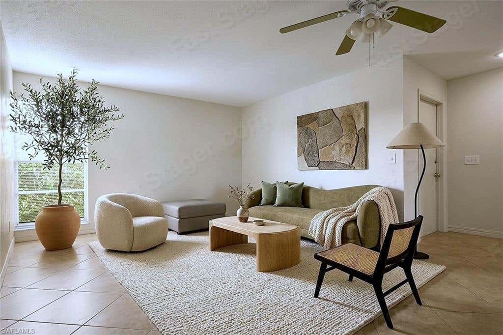 Photo of 4133 Lakewood BLVD #E27, NAPLES, FL 34112 (MLS # 226027770)