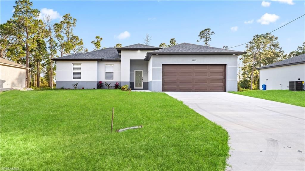 Photo of 610 Flamingo AVE, LEHIGH ACRES, FL 33974 (MLS # 225083175)