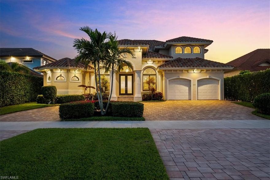 This stunning two-story luxury residence in the heart of Marco Island offers the ultimate in Florida waterfront living and is perfectly positioned to capture expansive bay views and amazing palm tree lined sunsets.Featuring 4 spacious bedrooms and 4 full baths, a flex room, plus a dedicated office/den, this home provides ample space for family, guests, and productive remote work.  The open-concept design boasts soaring high ceilings that create an open, airy atmosphere throughout the main living areas, complemented by elegant travertine floors that flow seamlessly from room to room. 
The outdoor oasis is truly spectacular: a large infinity edgeless pool and spa merge seamlessly with the panoramic bay beyond.  Imagine unwinding in your private spa or heading out on your boat from your private dock with a 13,000 lb remote control boat lift with fish cleaning station.Additional highlights include a circle drive for easy arrival and ample parking, a centrally located address that's convenient to shopping, dining, and beaches. The home is offered furnished/turnkey—just bring your suitcase and start enjoying the lifestyle immediately.Experience the magic of Marco Island waterfront living at its finest—where every day ends with a spectacular sunset over the bay.