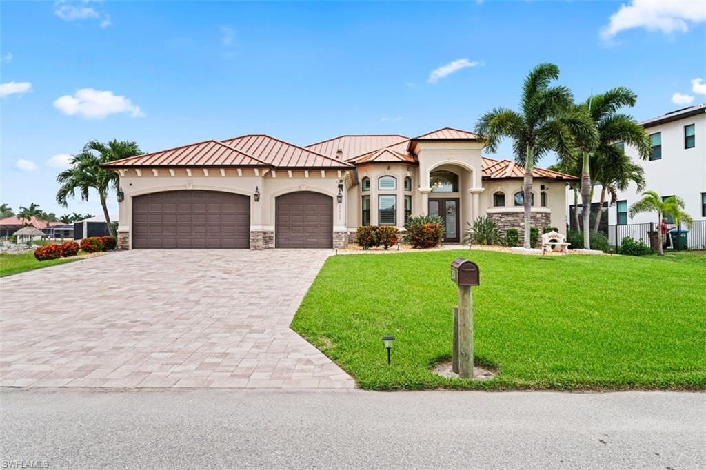 Photo of 2639 SW 29th AVE, CAPE CORAL, FL 33914 (MLS # 226022677)