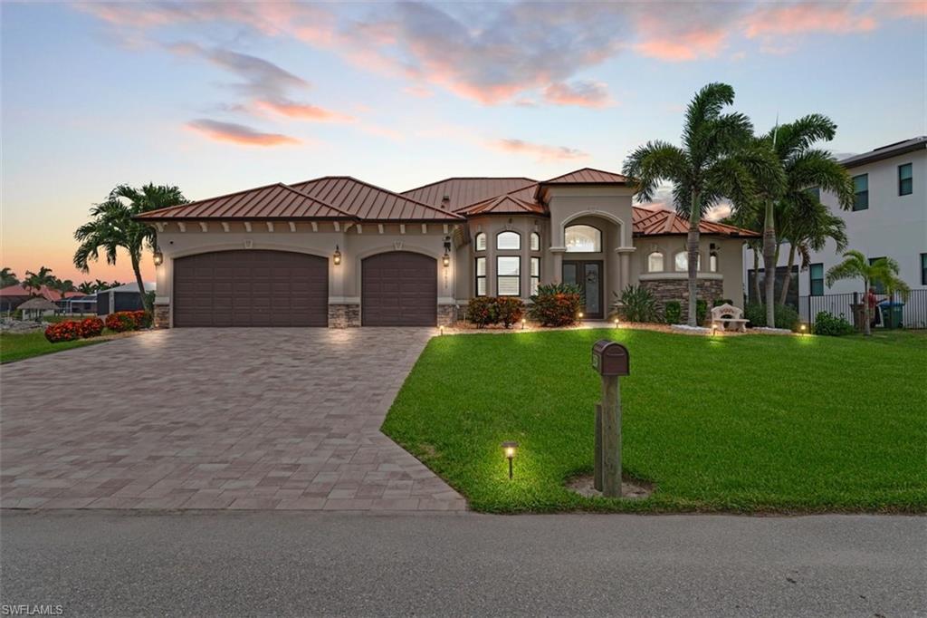 Photo of 2639 SW 29th AVE, CAPE CORAL, FL 33914 (MLS # 226022677)