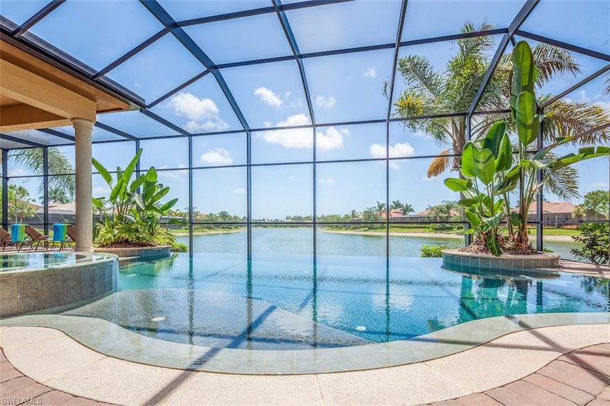 This sought after four bedroom, three bath SW facing Harbortown home is situated at the end of a long lake in the private double-gated prestigious Majors at Lely Resort.  The centerpiece feature of the home is the amazing 'wet deck' infinity edge salt system free form pool and spa, which is perfectly situated within the large screened in 32ft x 54ft deck for stunning sunny southwest panoramic long lake sunset views.  This Dream Home is Professionally decorated in a contemporary style and has ample entertaining space inside and out, with features that include, a state of the art gourmet kitchen, sound system, upgraded ceiling fixtures, outdoor shower, and a 3 car garage .  Enjoy the highly renowned Players Club and Spa which offers resort style swimming pools with waterfalls and kids area, state of the art tennis facility, 3500 sq. ft. fitness center, restaurant, tiki bar, pool room, theater room, pickle ball, bocce ball and Spa. Lely Resort is also home to three Championship 18 hole Golf courses.