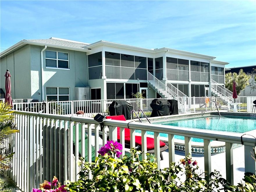 GULF ACCESS Condo 2/2 POOL Imagine sunsets from your balcony or quick boat trips to the nearby islands. Just a short walk to downtown Cape Coral where you can immerse yourself in local culture, dining and shopping. This condo's prime location means you're never far from the action or the peaceful tranquility of quiet coastal luxury living. Enjoy your balcony with an exclusive private staircase leading directly to the community pool. This newly constructed balcony features superior hurricane-grade sliders enhancing your living experience. New roof, new AC & handler for ultimate comfort and a top of the line Rheem hot water on demand throughout. New eco-friendly double flush toilets for water efficiency. Furniture included (your choice). Discover a rare gem that combines luxury, resilience, and convenience in one spectacular property. Call for private showing today.