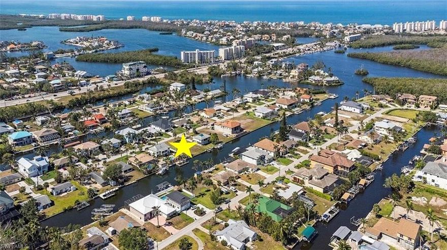 Design and build your ultimate waterfront retreat on this exceptional residential lot in the coveted Imperial Shores of Bonita Springs. Set along a pristine 90-foot-wide canal with direct Gulf access and a seawall already in place, this property is the perfect foundation for a luxury residence that embraces both sophistication and adventure. Tucked away on a smaller street that ends with a cul-de-sac, it offers a serene setting while keeping you moments from the vibrant coastal lifestyle. Take a short boat ride through Little Hickory Bay, Fish Trap Bay, or Estero Bay before reaching the sparkling Gulf of Mexico where endless days of boating, fishing, and sunsets await. This lot truly offers a combination of elegance, exclusivity, and effortless access to Southwest Florida’s most treasured waters quite like this.