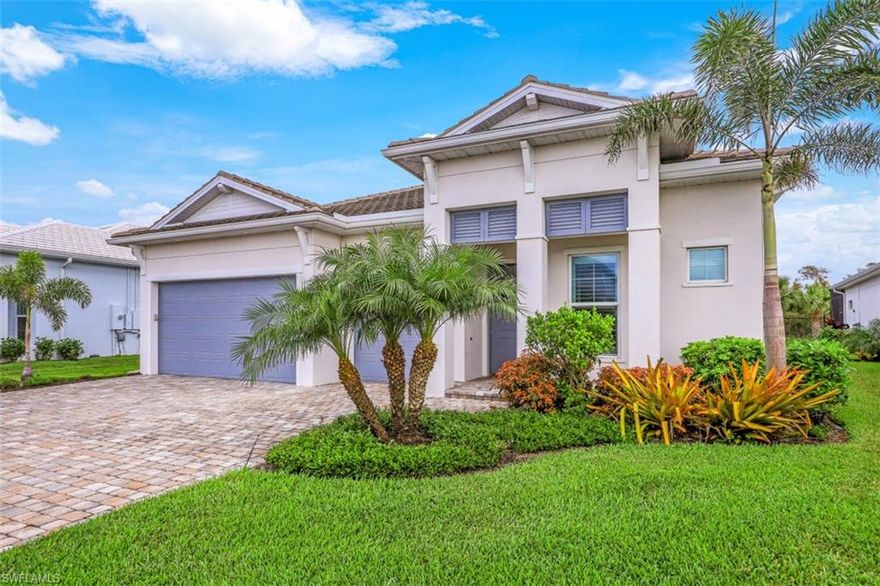 REDUCED TO SELL!! This single floor home welcomes you through its elegant foyer into a timeless floor plan. This stunning, 2,842 square-foot Athena model Heritage Collection home features three bedrooms, two full baths, powder room, a private study and a three-car garage. Other items include quartz counter tops with full height quartz backsplash, a private laundry room with laundry tub, staggered tiles throughout, plantation shutters, coffered ceilings in the living and dining rooms. Also included expansive great room, gourmet kitchen with walk-in pantry, gas stove top with fully ducted hood, sunlit breakfast area and a formal dining room. The home’s private master suite features a coffered ceiling, two walk-in closets and a lavish master bath. Walk-through shower, separate vanities.
Impact doors, windows and sliders and electric shades for sliders. Private, serene Preserve-view home site, and extended panoramic lanai and saltwater pool system.
The appliances are all Whirlpool and the oven is connected to wifi, which means it can be operated with a phone-app remotely.   Amenities include a large pool, cabanas, beautiful club house, fitness center, library, billiards room, tennis and pickle ball.