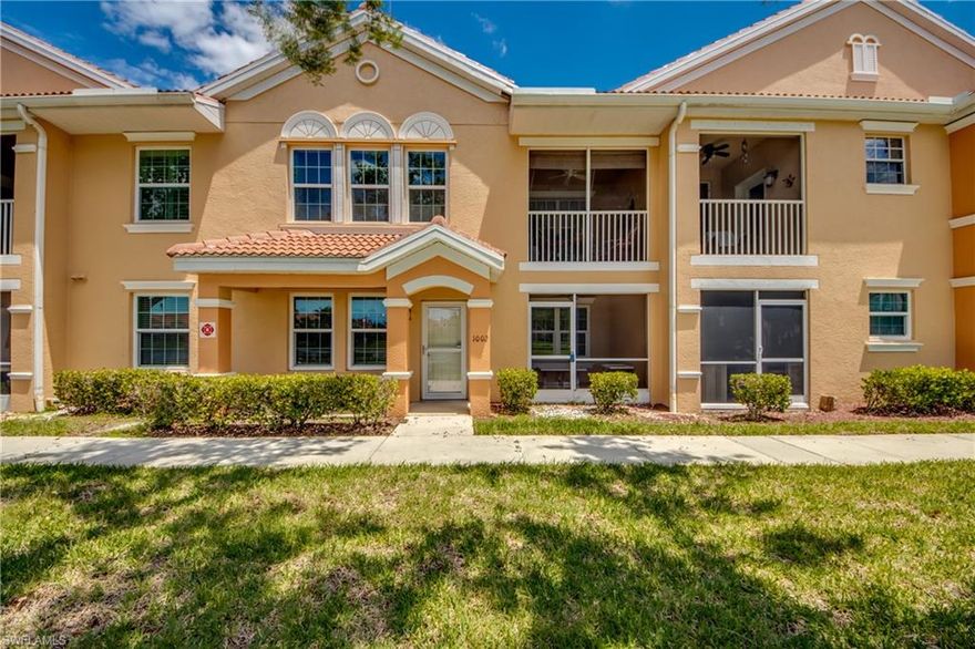 RARELY AVAILABLE BEAUTIFUL 1ST FLOOR LAKE FRONT CONDO! Relax and enjoy one of the best 5 acre lake views with tranquil fountain from your cozy front porch and screened lanai.  Striking upgrades include crown molding, volume ceilings, plank tile floors. Kitchen features stainless steel appliances, quartz counters, white shaker style cabinets a convenient breakfast bar and dining area. The primary suite is spacious with a walk-in closet, en suite bathroom with a soaker tub, shower, vanity with quartz countertops, Family & friends will enjoy the 2nd bedroom with a bathroom right across the hall with an attractive large tiled shower & vanity with quartz countertops. The laundry room is right off the kitchen and features high end front loading stainless steel washer & dryer while the tandem 2 car garage is spacious and provides ample storage space and 3 convenient entry doors to the unit Enjoy resort style living in the desirable Concordia community with beautiful landscaping, resort style infinity edge pool & spa, fitness center & jogging path. HOA fees include all utilities except electric. This highly coveted location is one of a kind meticulously maintained and ready for new owners.