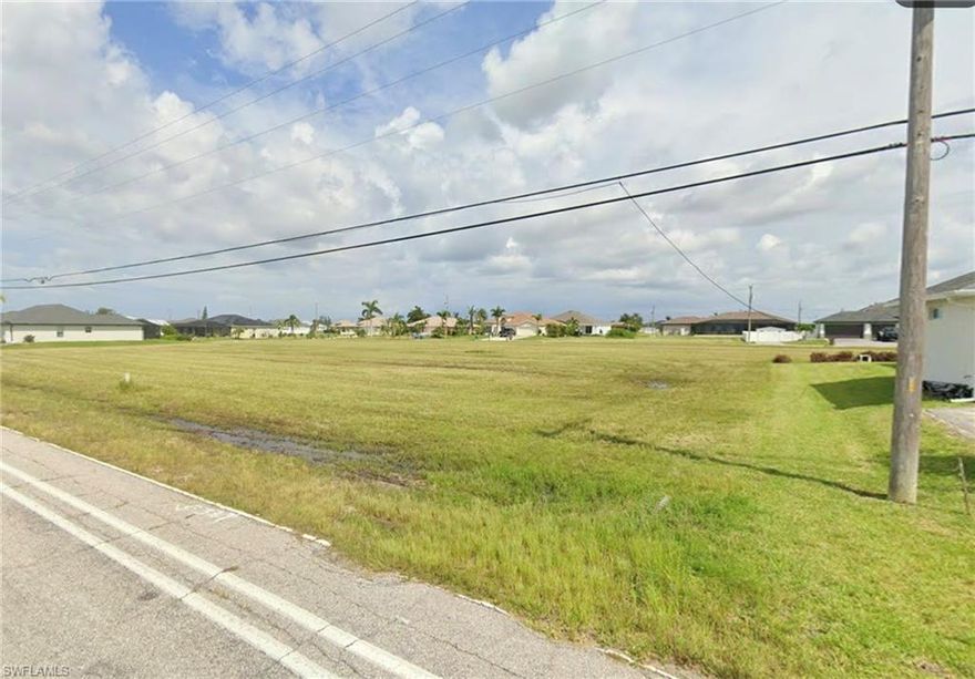 Seller will consider financing, offering a great opportunity for flexible terms!!! Build your dream home on this lot in Cape Coral’s desirable Northwest area! With 80 feet of frontage on Tropicana Parkway West, there’s plenty of room for a custom residence, pool, and outdoor living space. This fast-growing neighborhood features freshly paved roads and is surrounded by new construction, making it a prime investment opportunity. Conveniently located near the Burnt Store Community Boat Ramp (Gulf access), community parks, shops, dining, and Matlacha, with easy access to both Charlotte County Airport and Fort Myers International Airport. Don’t miss your chance to secure this perfect homesite in Southwest Florida! Even better, the neighboring lots at 3501 and 3503 Tropicana Pkwy W are also available, offering the opportunity to combine all three adjoining lots 3417, 3501, and 3503 into 0.5-acre homesite. *Seller financing available. Seller also has 3 other lots if interested in buying a package.