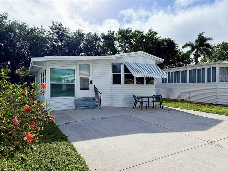 Excellent location! Affordable Living! Plus, YOU OWN the LAND! Thank you for viewing 5 Bass Lane in Imperial Wilderness Condominium Association---a gated 55+ community that is conveniently located! It is approximately 2 miles to shopping and restaurants, 8 miles to Marco Island beaches, and 10 miles to Naples beaches. This 2Br/1.5Ba home offers a spacious kitchen, living room with a sleeper-sofa, and furnishings that stay. Since 2024 the following updates occurred: stainless-steel appliances, A/C, vinyl roof-over, siding, some windows, some flooring, and the LR ceiling fan. The HOA fee of $898. per quarter is very reasonable and covers many of your needs: water, lawn care, basic cable, trash/recycling, and community amenities. Community amenities include the following: 2 pools with spas, bocce, pickleball, pétanque, tennis, shuffleboard, billiards, ping pong, a library, clubhouse, dog parks, and an extremely active events calendar!