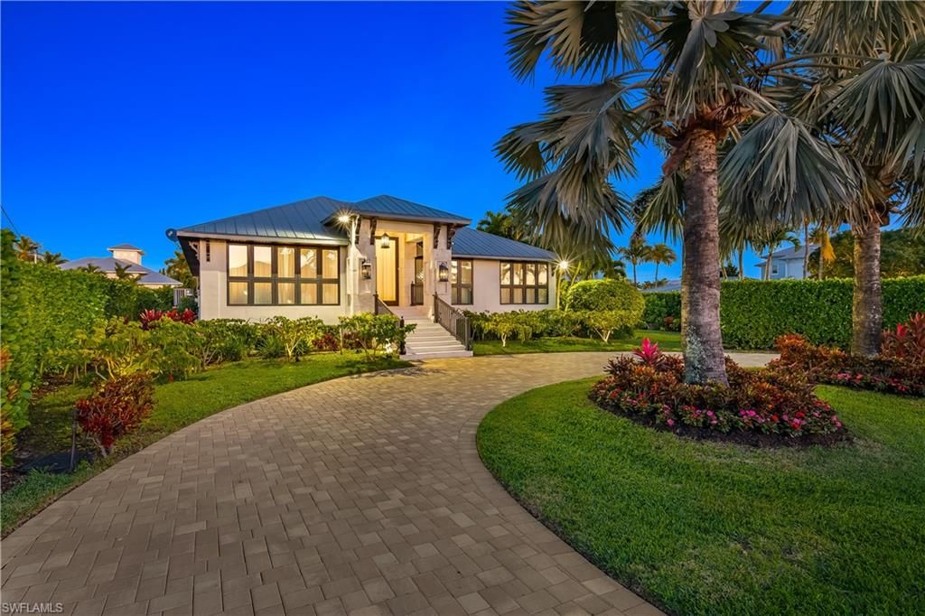 Photo of 1585 Mullet LN, NAPLES, FL 34102 (MLS # 226015381)