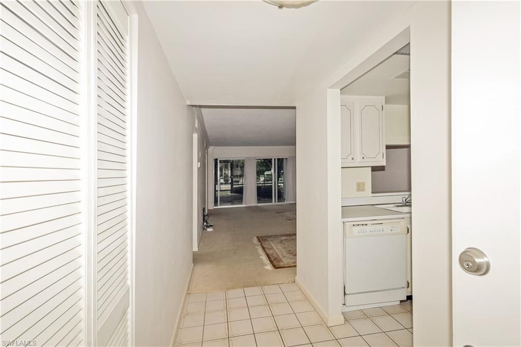 Photo of 3030 Binnacle DR #107, NAPLES, FL 34103 (MLS # 225081429)