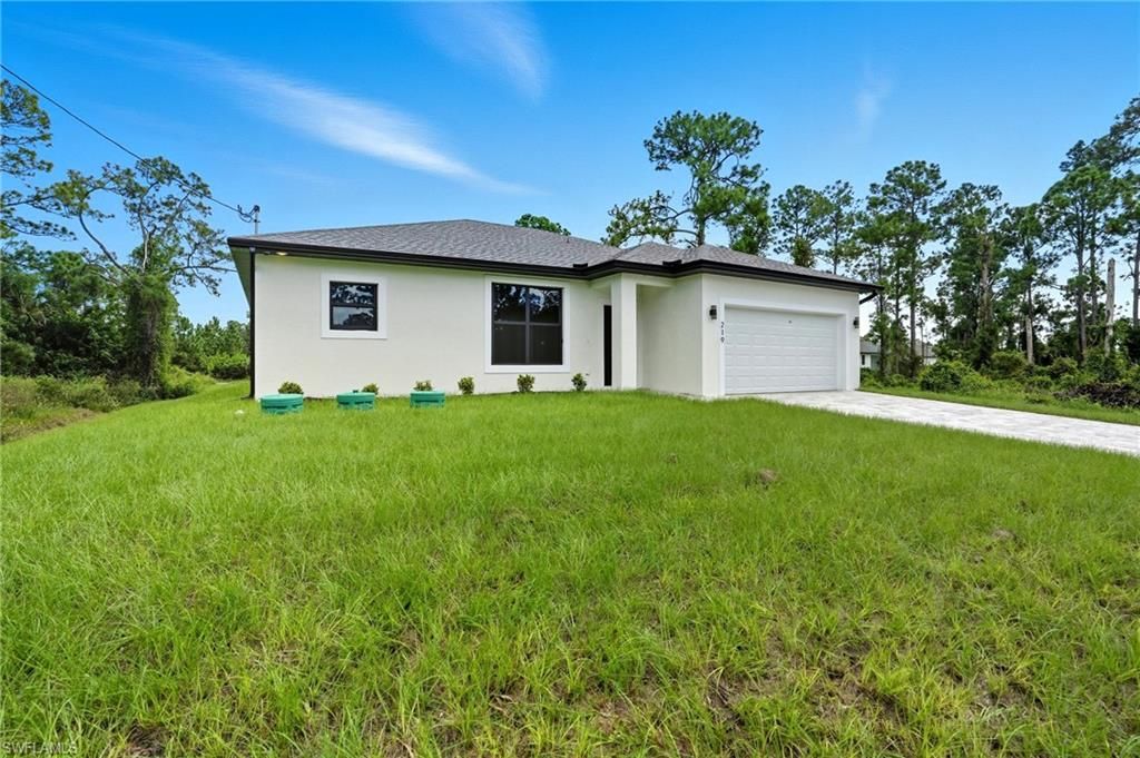 Photo of 219 Ogden AVE S, LEHIGH ACRES, FL 33974 (MLS # 226016676)