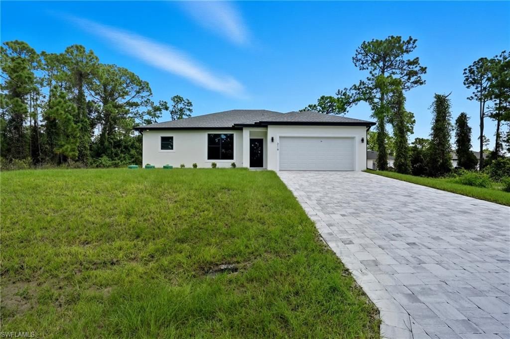Photo of 219 Ogden AVE S, LEHIGH ACRES, FL 33974 (MLS # 226016676)