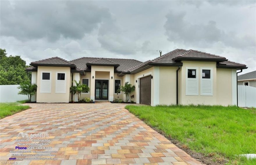 Stunning home !!! Great floor plan featuring 4 bedrooms and 3 beautifully designed bathrooms, 1824  SF under air, impact windows and doors, 8' interior and exterior doors, deluxe 24x24 rectified porcelain tile floor throughout, quartz counter tops including Kitchens, bathrooms, laundry and windows sills. Modern kitchen with wood cabinets. Spacious living room leads to large lanai with summer kitchen, oversize salt water pool and Jacuzzi to enjoy the SW Florida lifestyle. This house is conveniently located in the heart of Cape Coral. Near to High School and Middle School , close to everything. Great neighborhood!!! Location, Location, Location !!!!!