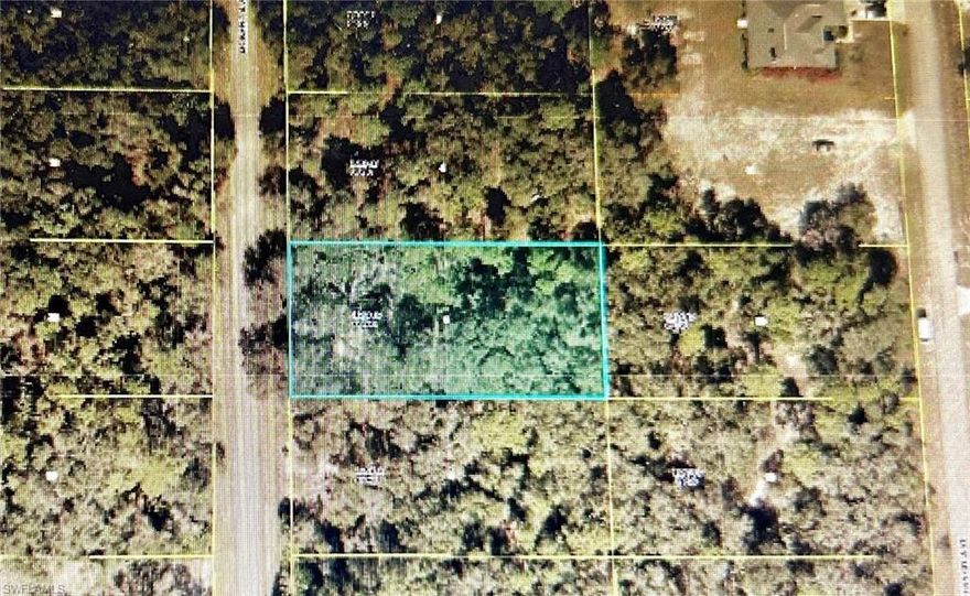 1/2 acre in a desired area of Lehigh Acres.  Near Joel Blvd. Buy now to build your dream home or buy to invest in Sunny Florida!