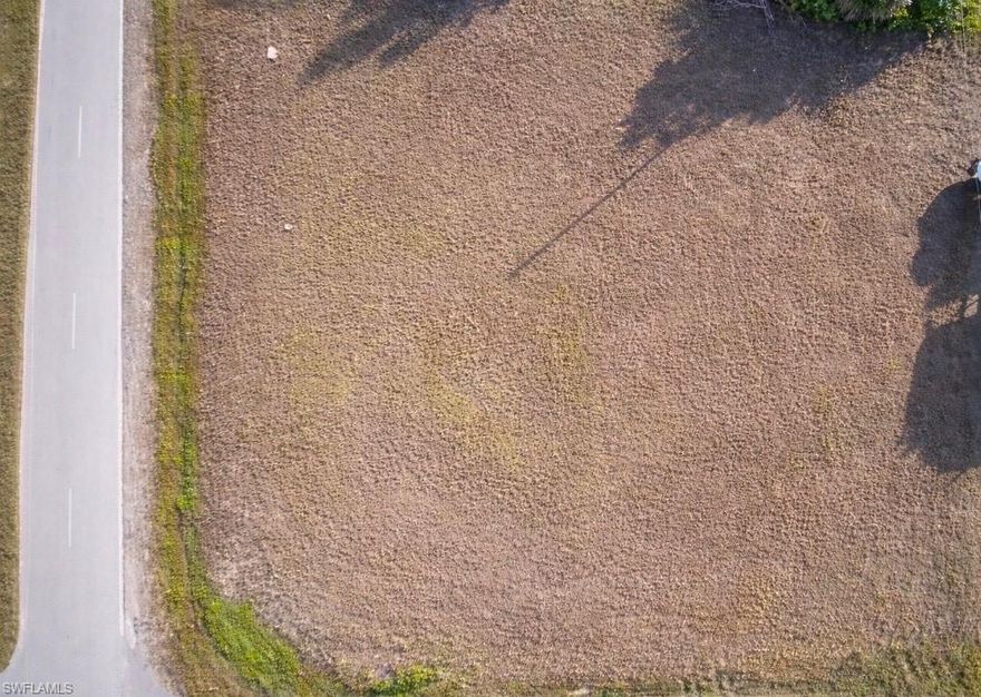 This lot is an excellent investment for you, located in a central location in the city of Cape Coral. It is a spacious 0.34 oversized lot on a corner where your new home can shine. It is clean and ready to build. It is an area that is under development, close to golf courses, entertainment parks for your children, and close to shops, schools, supermarkets, and more...
