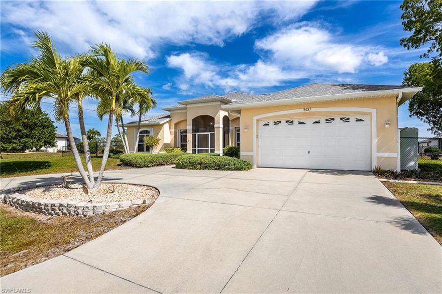 Welcome to your private slice of Southwest Florida living, where space, comfort, and lifestyle come together seamlessly. Situated on a rare triple lot, this property offers exceptional room to spread out which is an increasingly hard-to-find opportunity in today’s market.

As you arrive, the circular driveway creates a grand first impression while providing ample parking for guests. Step inside to a spacious open-concept floor plan featuring a light-filled great room, a versatile den/home office, and a formal dining space designed for both everyday living and entertaining.

At the center of the home is a beautifully appointed chef’s kitchen with granite countertops, newer appliances, and abundant workspace. A charming bay window breakfast nook overlooks the outdoor living area, while expansive sliding glass doors across the back of the home fill the space with natural light and create effortless indoor-outdoor flow.

Designed for comfort and privacy, the split-bedroom floor plan offers flexibility with 4 bedrooms plus a den, easily functioning as a 5th bedroom, ideal for guests, family, or remote work.

Step outside and experience what truly sets this home apart, a HUGE resort-style pool, perfect for swimming laps, surrounded by an expansive entertaining patio with plenty of space to host, relax, and enjoy the Florida sunshine. The fenced backyard and concrete dock add to the lifestyle appeal, offering both privacy and functionality.

This home also offers valuable upgrades for peace of mind and efficiency, including accordion hurricane shutters on all windows and doors, a whole-home surge protector, a reverse osmosis (R/O) water system, and a roof replaced in 2021.

Located in the heart of SWFL, you’re just minutes from top-rated dining, shopping, boating, and the white-sand beaches the area is known for.

This is a rare opportunity to own a spacious, move-in-ready home on a triple lot with a large pool, upgraded systems, and true indoor-outdoor Florida living. Schedule your private showing today.