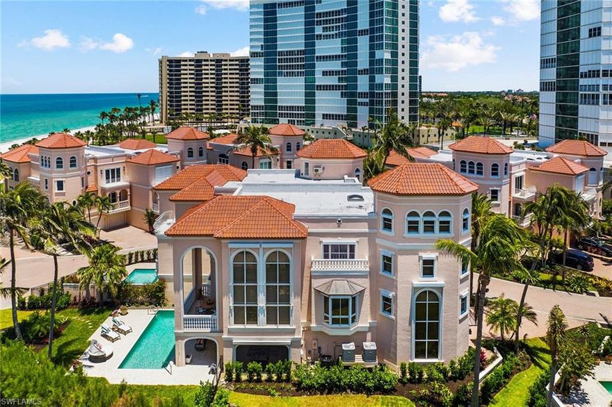 This fabulous seaside villa, in the exclusive enclave of Casa Mar, offers a lifestyle like no other! A perfect beach retreat, it encompasses over 7,000 square feet total with its own private pool, fenced yard and direct access to Park Shore’s beautiful private beach. Offered by the original owners, it has been treasured for the fantastic outdoor spaces, magical year-round sunsets and 2-story wall of windows on the west and southwest. The kitchen was completely remodeled in 2022 and features top-of-the-line Thermador appliances, huge island, custom cabinetry and wood flooring. Wake up to the sound of the surf and Gulf views from the primary suite with a private balcony - a perfect way to greet the day. Hosting friends and family is a breeze with three spacious guest bedrooms, including a fun private loft area on the fourth floor - all with full baths. For the boater, Venetian Bay Yacht Club across the street offers docks for lease or purchase. Fabulous dining and world-class shopping are a short distance away at the Village on Venetian Bay. The HOA provides a full package of services including pool care, AC and elevator annual service and landscaping. Pets are welcome.